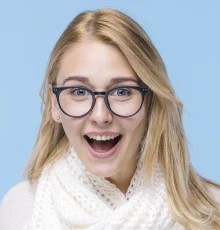 Happy blonde woman wearing fashionable prescription glasses